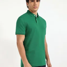 Tommy Hilfiger Men Solid Polo Collar Cotton T-shirt image 4