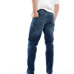 asos design Men Mid-Wash Tapered Jeans image 2
