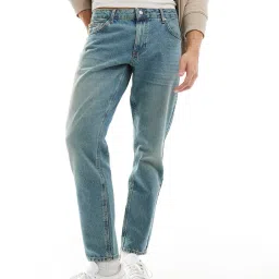 asos design Men Lightly Washed Tapered Jeans image 1