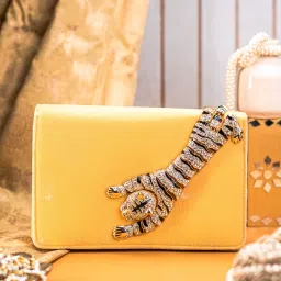 NR BY NIDHI RATHI Golden Velvet Clutch with Tiger Motif Ad Brooch image 1