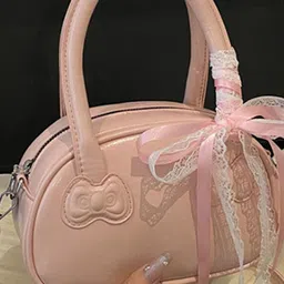 StyleCast Women Solid Structured Bow Detail Handheld Bag image 2