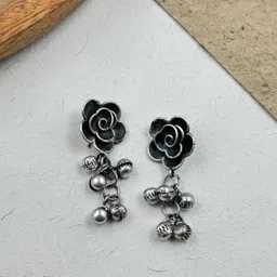NAMAN ARTS Silver-Plated Floral Shaped Oxidised Drop Earrings-picture-12