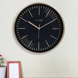 random Tic Toc Black & Gold Plastic Wall Clock image 1