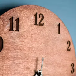 QEZNEF Brown Geometric Round Wooden Analogue Wall Clock image 4