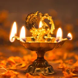 Fabindia Mayur Gold Toned Brass Diya-image-57