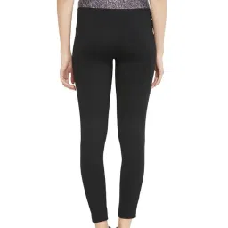 clovia Women's Snug-Fit High Rise Active Tights with Printed Waistband in Black image 3