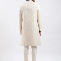 vastramay Men's Cream And Gold Silk Blend Sherwani Set - Step Into Refined Elegance With This Luxurious Silk Blend Jacquard Sherwani With Kurta And Pyjama. image 4