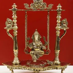 Exotic India Gold Toned Brass Ganesha on Swing Idol Showpiece-picture-38