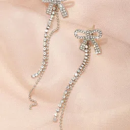 VAGHBHATT Silver-Plated Rhinestone Studded Bow Design Drop Earrings-picture-14