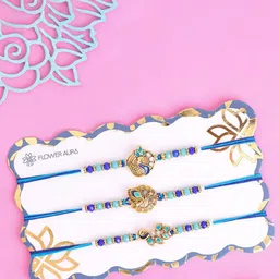 Floweraura Premium Set of 3 Stones Studded Beaded Peacock Thread Rakhis With Roli-picture-28