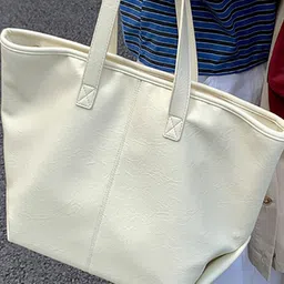 StyleCast x Revolte Bucket Tote Bag image 5
