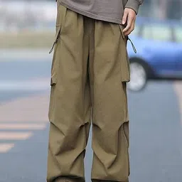 StyleCast x Revolte Men Solid Loose Fit Easy Wash Pleated Cargos Trousers image 1