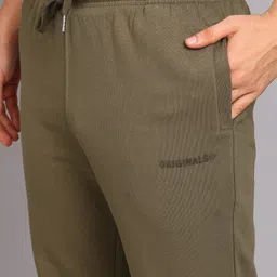 alan jones Men Solid Green Track Pants image 5