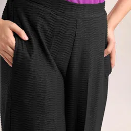 PURVAJA Women Textured Relaxed Straight Leg Loose Fit High-Rise Easy Wash Trousers image 5