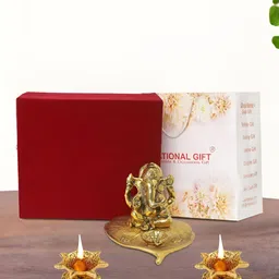 INTERNATIONAL GIFT Gold-Toned 3 Pcs Leaf Ganesh Idol Showpiece With Diya And Gift Box-image-57