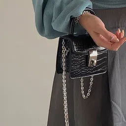 StyleCast x Revolte Textured PU Sling Bag with Cut Work image 4