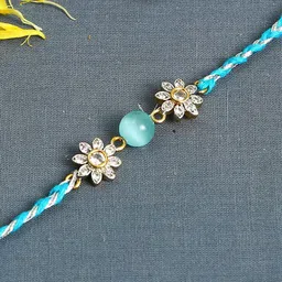 Aapno Rajasthan Turquoise Blue Floral AD Studded Rakhi with Roli Chawal & Card-picture-39