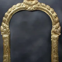 Exotic India Gold Toned Thiruvachi Arch Brass Temple Prabhavali-picture-15
