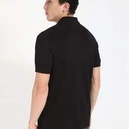 Tommy Hilfiger Men Solid Polo Collar Cotton T-shirt image 5