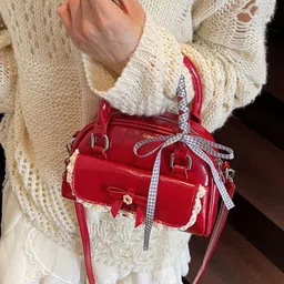 StyleCast x Revolte Women Solid Structured Bow Detail Satchel Bag image 2