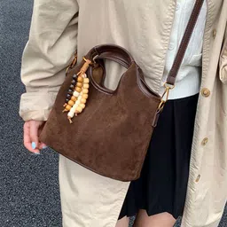 StyleCast x Revolte PU Bucket Sling Bag with Tasselled-picture-12