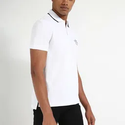Tommy Hilfiger Men Solid Polo Collar Cotton T-shirt image 4