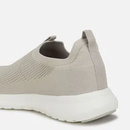Reebok Men Textured Slip-On Walking Shoes image 5