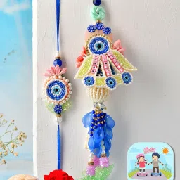 CraftVatika Premium Evil Eye Rakhi Set for Brother Bhabhi | Designer Rakhi Set for Bhaiya Bhabhi Pair | Evil Eye Lumba Couple Pair Rakhis with Fridge Magnet Gift, Rakshabandhan Greeting Card, Tilak Set,Home decor image 1