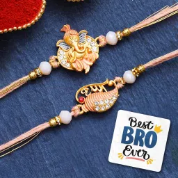 eCraftIndia Set of 2 Lord Ganesha, Krishna Rakhis, Best Bro Ever Fridge Magnet with Roli Chawal Pack - Rakhis for Brother, Bhabhi, Kids image 1