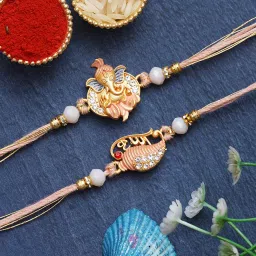 eCraftIndia Set of 2 Lord Ganesha, Krishna Rakhis, Best Bro Ever Fridge Magnet with Roli Chawal Pack - Rakhis for Brother, Bhabhi, Kids image 2