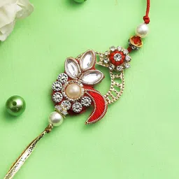 Aapno Rajasthan Red & Gold-Toned Artistic Kundan Embedded Rakhi-picture-16