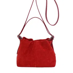 StyleCast x Revolte Swagger Sling Bag image 1