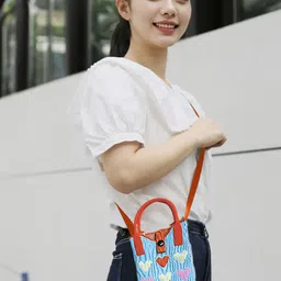 Carry Trip Women Textured Crossbody Sling Bag image 1