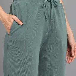 alan jones Women Solid Green Track Pants image 4