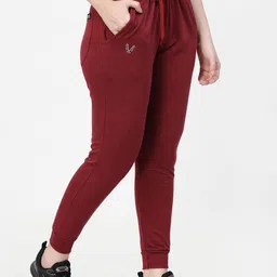 uzarus Women Solid Maroon Track Pants image 1