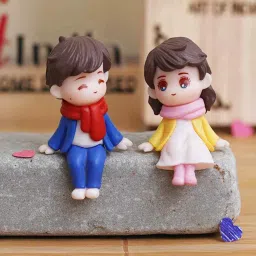 ecraftindia Cute Boy & Girl Sitting Multicolour Polyresin Showpieces image 2