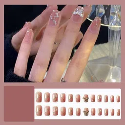 secret lives Designer Artifical extension nails with glue sheet nude shade with silver color bow and glitters design image 2