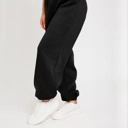 lakhpati Women Solid Black Track Pants image 3