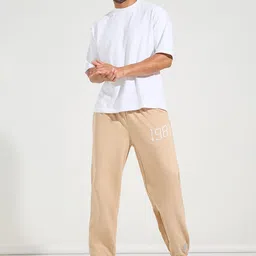 Styli Men Beige Relaxed Fit Pure Cotton Terry Jogger With Side Cord And Embroidery Detail image 1