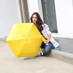 hope smile Capsule Mini Travel Umbrella 4 fold (UV PROOF WINDPROOF) Umbrella image 3
