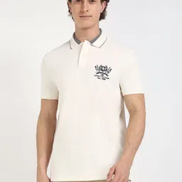 Tommy Hilfiger Men Solid Polo Collar Cotton T-shirt image 1