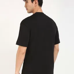 Calvin Klein Jeans Men Solid Round Neck Cotton T-shirt image 5