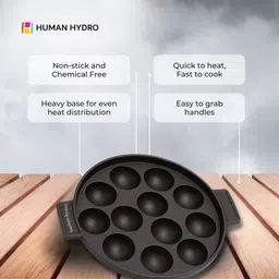 human hydro Pre-Seasoned Cast Iron 12-Pit Paniyaram Pan/Appam Patra with Glass Lid Paniarakkal Set with Lid 1.1 L capacity 20 cm diameter image 2