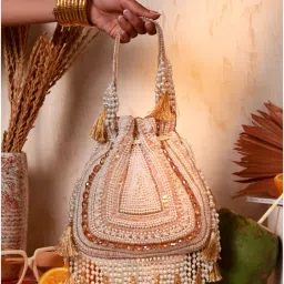 THE TAN CLAN Nora Beige Tasselled Potli Bag-image-81