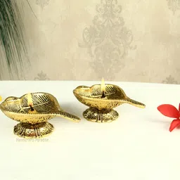 HANDICRAFTS PARADISE Gold Toned 2 Pcs Leaf Shaped Antique Metal Pooja Diyas-image-71