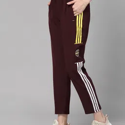 uzarus Women Striped Maroon Track Pants image 1