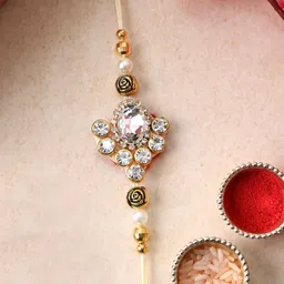 PANASH Set Of 2 Gold Plated Floral Shaped Rakhi with Roli Chawal With Roli Chawal image 4
