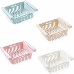 craftaura Plastic This is a convenient storage organizer for your refrigerator or in the kitchen. Environmently & durable material- Premium PP material, durable, eco-friendly and odor-free. Made of ABS, non-toxic and wear resistant.Make the most of your freezer, sort things out and keep them organized Easy to use- Sliding design, easy to glide in and out the foods,Mount it on the compartment of your refrigerator, maximize the utility of space Keep clean- Perfect for organizing canned drinks, cheeses, bagged frozen vegetables and other food items in the fridge,keep the refrigerator neat and clean It can make the bulk of your freezer and make storage easier. Can to be used in refrigerator, kitchen pantry or for storing fruits, eggs, snacks etc. Storage Basket-picture-38