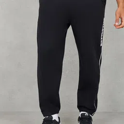 Styli Men Side Revolution Print Piped Detail Relaxed Terry Jogger-image-63