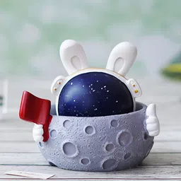 eCraftIndia Grey Figurine Moon Shaking Head With Red Flag Showpiece-image-52